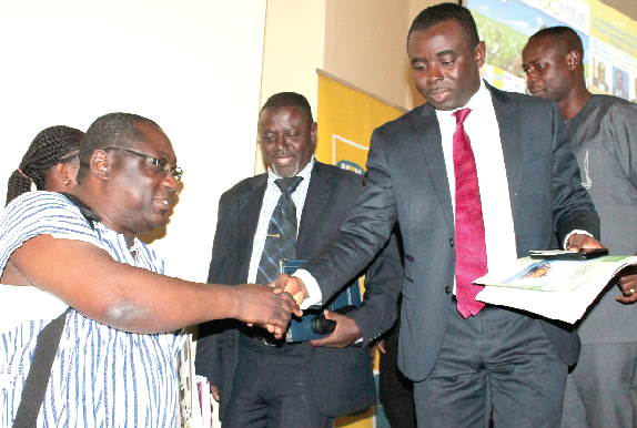 Prof. Joshua Abor (left) exchanging pleasantries with Mr Francis Osei